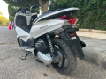 skotrhonda-by-sy-aks-125-modyl-2012-llbyaa-small-2