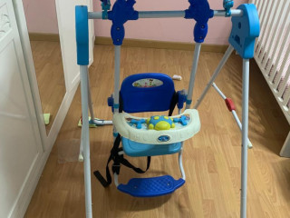 Baby swing and 2 toys