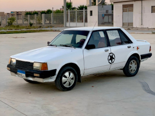 syar-mazda-323-modyl-1982-allon-abyd