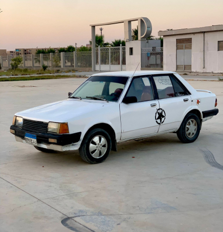 syar-mazda-323-modyl-1982-allon-abyd-big-0